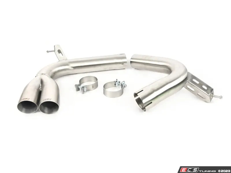 Stainless steel exhaust system with clamps on a white background