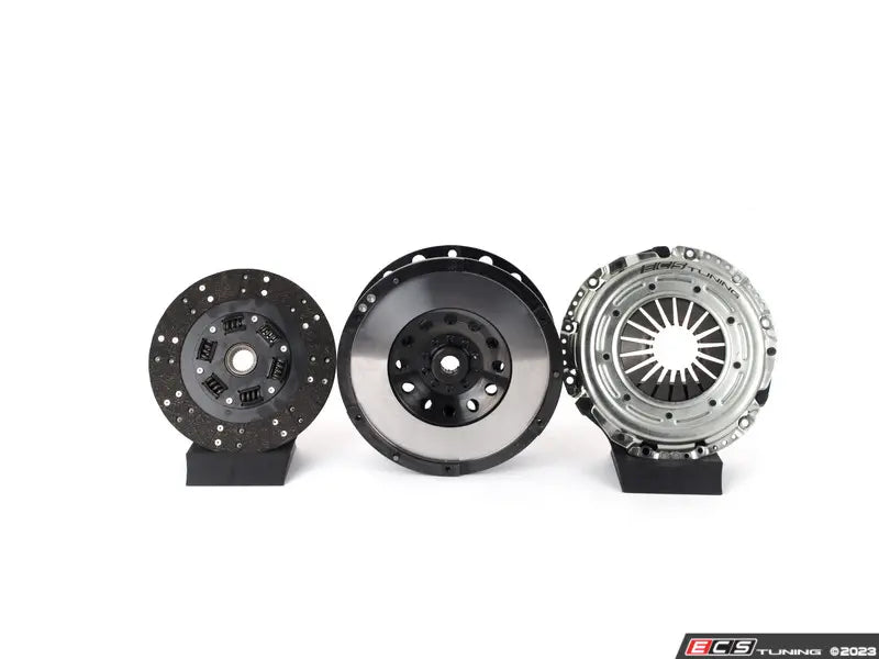 Three clutch components on stands against a white background with ECS Tuning logo.