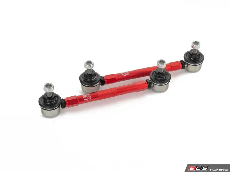 Red suspension links with silver ends on a white background