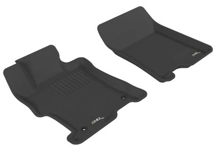 Two black car floor mats on a white background