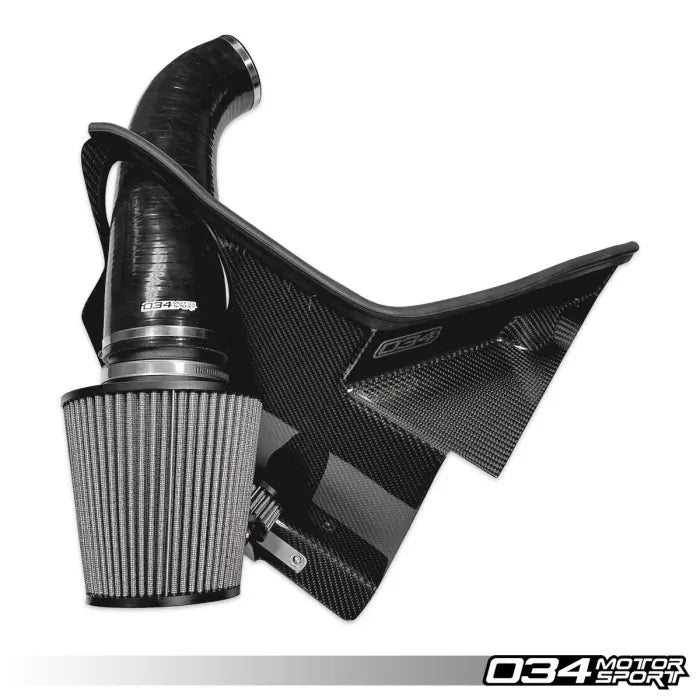 Carbon fiber air intake system with a filter on a white background, featuring the 034 Motorsport logo.