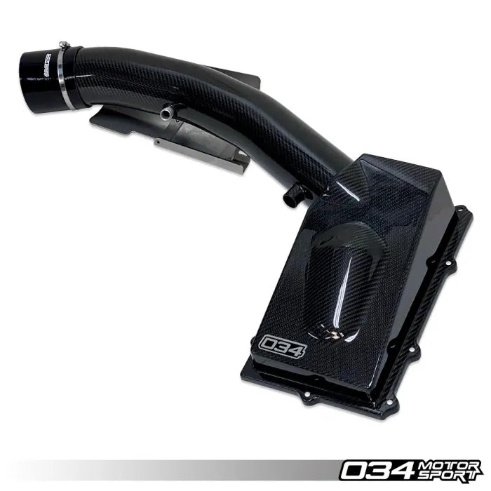 Carbon fiber intake manifold with '034 Motor Sport' branding on a white background