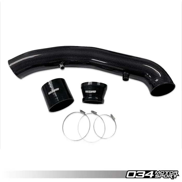 Carbon fiber intake manifold with black clamps and washers on a white background, featuring 034 Motorsport branding.