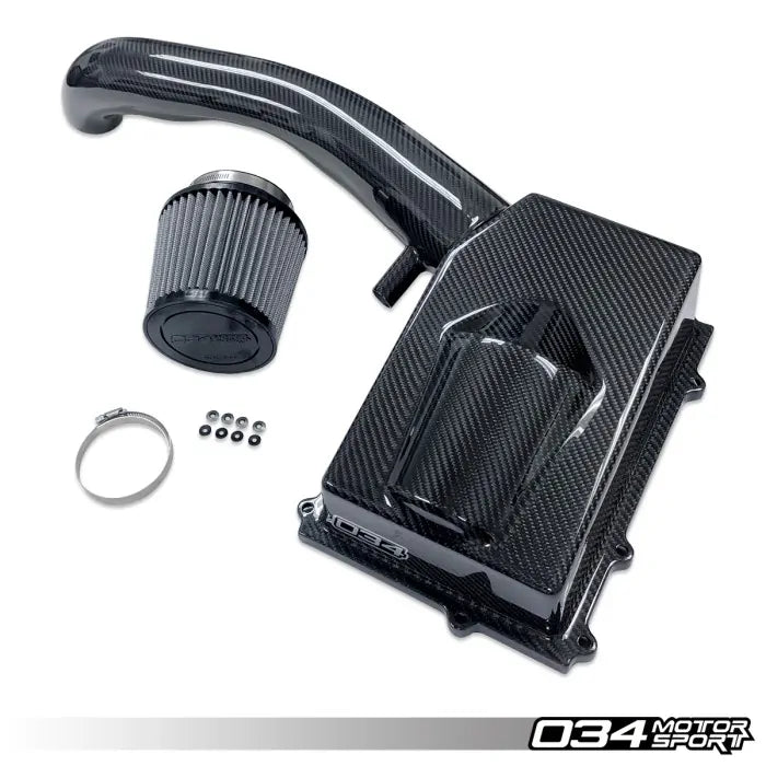 Carbon fiber air intake system with components on a white background, featuring the 034 Motor Sport logo.